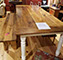 Accented with painted legs, this matching table and bench was displayed at the Artful Eye in St. Johnsbury, Vermont.