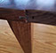 Table legs are made to match on this custom table.  Please feel free to contact us for further details. 