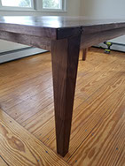 Table legs are made to match on this custom table.  Please feel free to contact us for further details. 